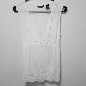 Sleeveless white blouse
